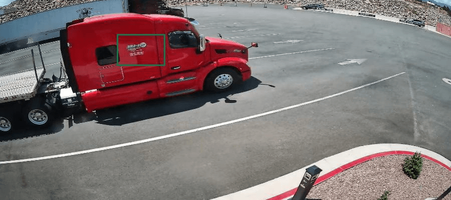 Security camera frame with the cab door boxed as the system reads the USDOT number off a passing truck